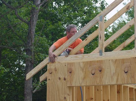 Installing the Roof Trusses and Sheathing