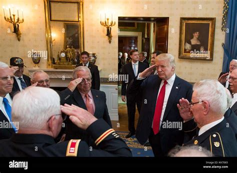 U.S. President Donald Trump salutes Medal of Honor recipient retired U.S. Army Capt. Gary M ...