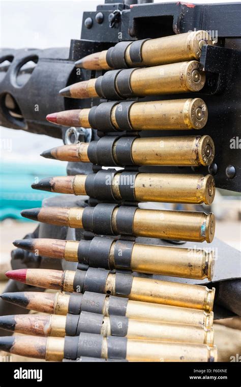 Close up of machine gun ammo belt with bullets in chamber of machine Stock Photo: 89760762 - Alamy