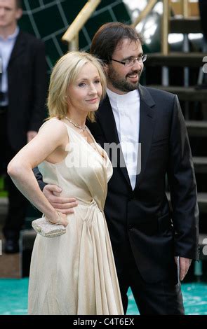 English author JK Rowling and her husband Dr Neil Murray arrive at the premier of "Harry Potter ...