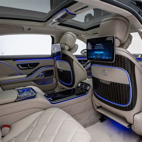 Luxury Car Interior with Blue Lights and Electronic Gadgets