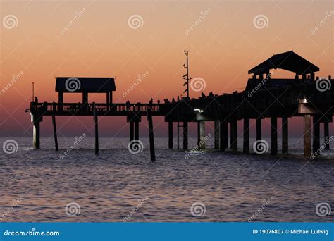 Pier 60 Sunset stock image. Image of water, sunset, pier - 19076807