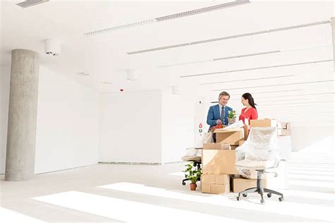 Moving Office Furniture Stock Photos, Pictures & Royalty-Free Images - iStock