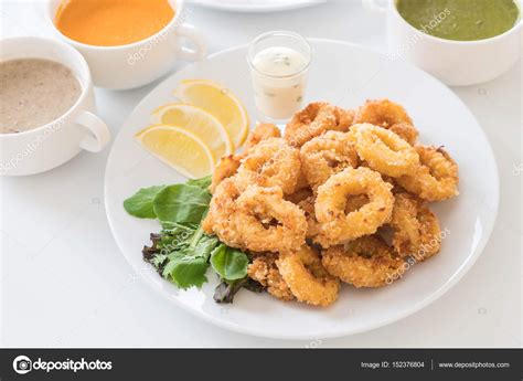 Fried squid (calamari rings) — Stock Photo © topntp #152376804