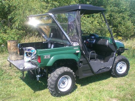 A Yamaha Rhino with a DiamondBack cargo box cover on the … | Flickr