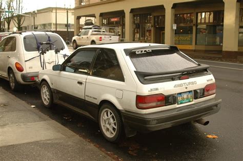 OLD PARKED CARS.: 1988 Mazda 323 GTX Turbo 4wd.