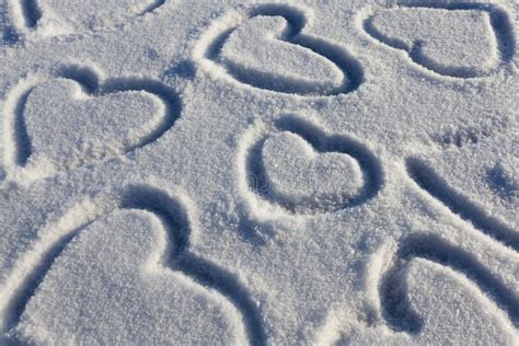 A Heart Symbol Drawn on Snow Stock Image - Image of romance, group ...