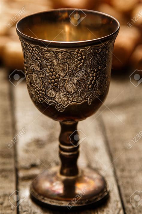 Medieval Goblet And Wine Corks On Wooden Table Stock Photo, Picture And ...