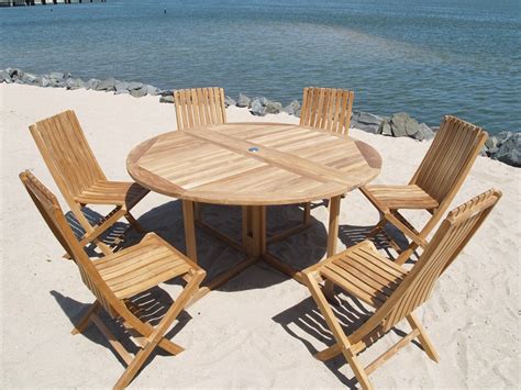 Barcelona 59" Round Drop Leaf Teak Table W/6 Java Folding Teak Chairs