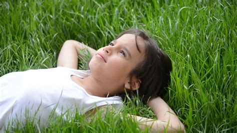 Cute Kid Lying On The Beautiful Green Grass, Summertime Relaxing Stock Footage Video 4005820 ...