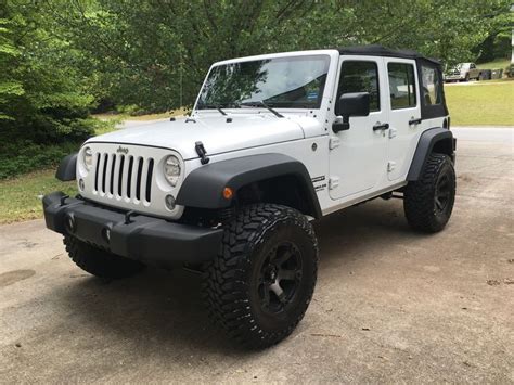 My new 2016 Wrangler Unlimited Sport. Four inch lift, 35 inch tires ...