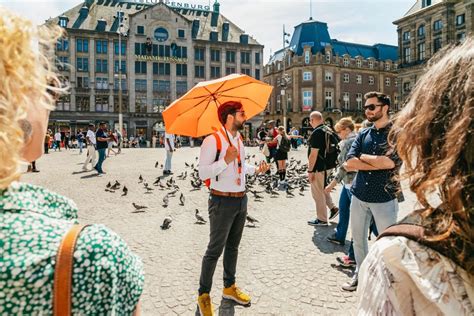 Amsterdam: Historical Highlights Walking Tour with Tasting | GetYourGuide