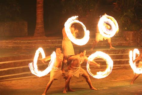 Fire dancers at the luau | Fire dancer, Neon signs, Fire