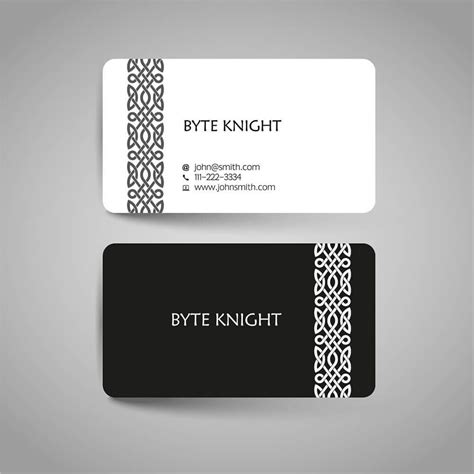 a business card with an intricate design on the front and back, in black and white