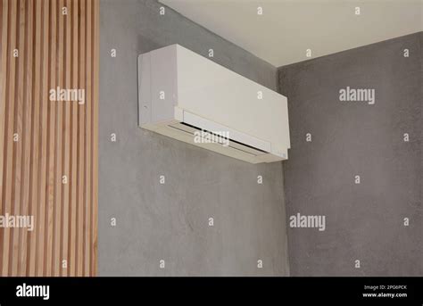 Close up on Ac Unit i modern house interior. Indoor AC unit wall ...