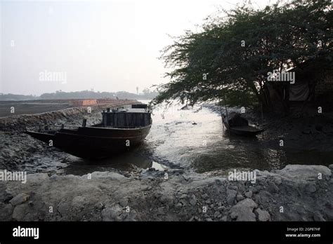 Traditional fishing boat in the delta of the Ganges River in Sundarbans ...