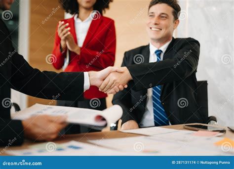 Business People Shaking Hands during a Meeting in Modern Office Stock Photo - Image of group ...