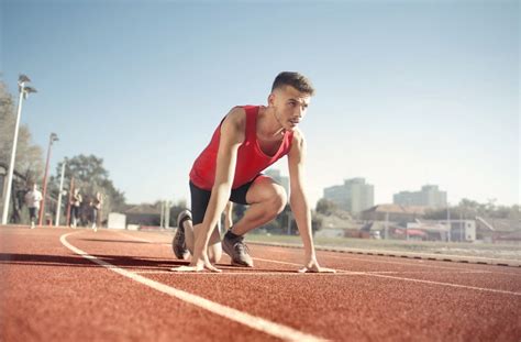 Athletes Running on Track and Field Oval in Grayscale Photography ...