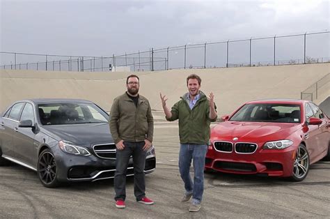 Video: 2014 BMW M5 vs. 2014 Mercedes-Benz E63 AMG