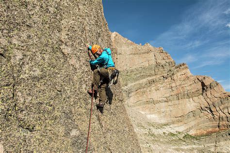 A Man Rock Climbing In Rocky Mountain Photograph by Kennan Harvey - Pixels