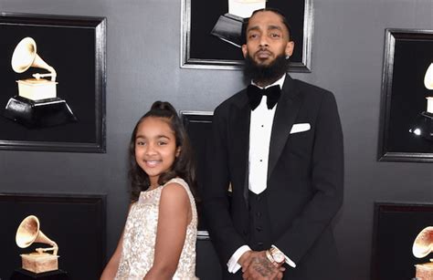 Nipsey Hussle’s Daughter Emani Honors Late Rapper at Elementary School Graduation | Complex