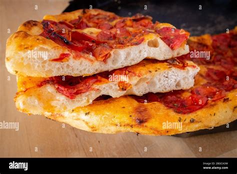 Slices of authentic homemade focaccia bread of Puglia Stock Photo - Alamy