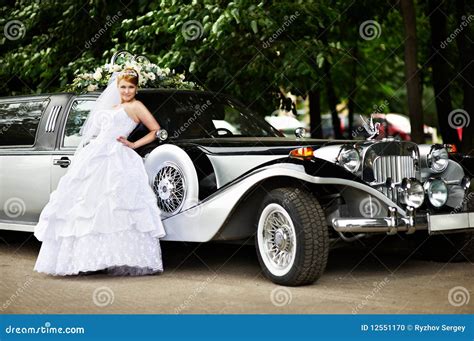 Luxury Bride in Wedding Dress about Limousine Stock Photo - Image of walk, look: 12551170