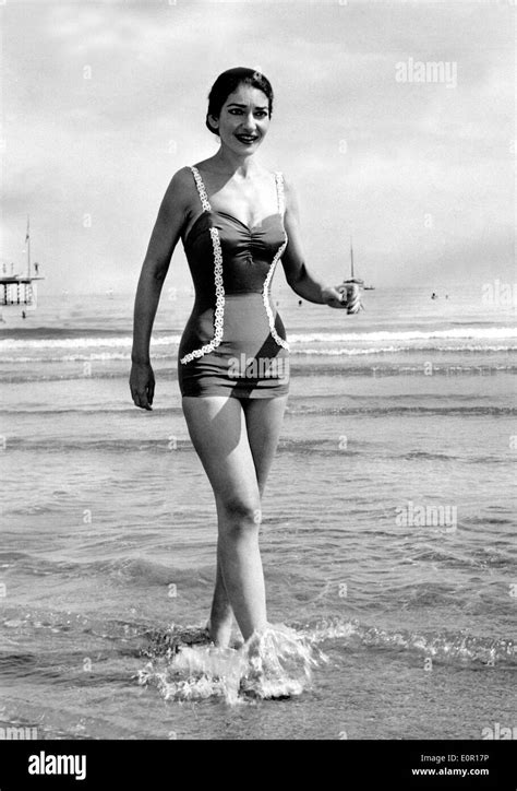 Opera singer Maria Callas walking on the beach Stock Photo - Alamy