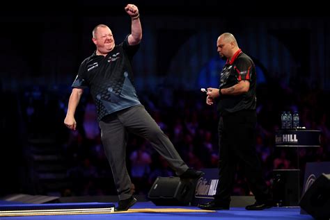 King and Humphries back from brink at PDC World Darts Championship