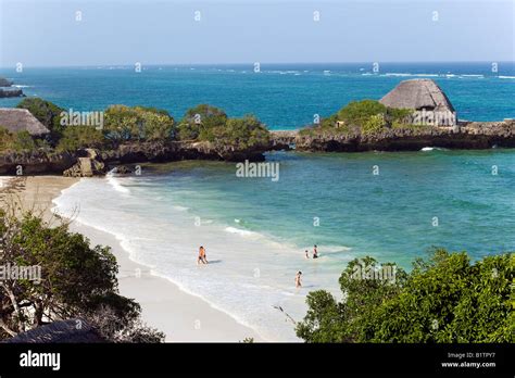 Tourists at beach The Sands Chale Island Coast Kenya Stock Photo - Alamy