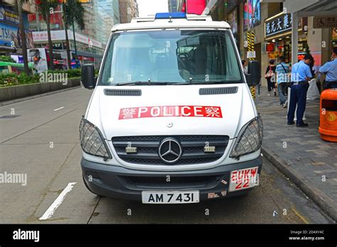 Hong Kong police vehicle on duty on Nathan Road in Kowloon, Hong Kong ...