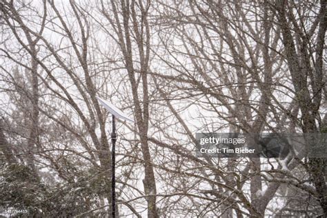 Starlink Antenna Dish Mounted To A Pole Falling Snow Melts Off The ...