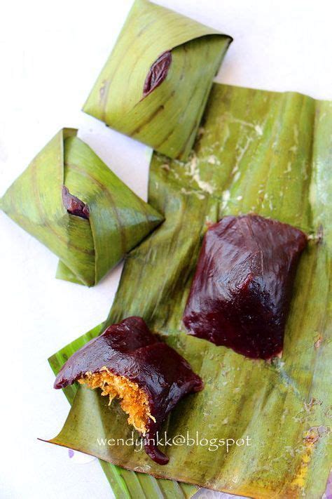 Kuih Koci is a chewy dumpling wrapped in banana leaf, with sweet ...