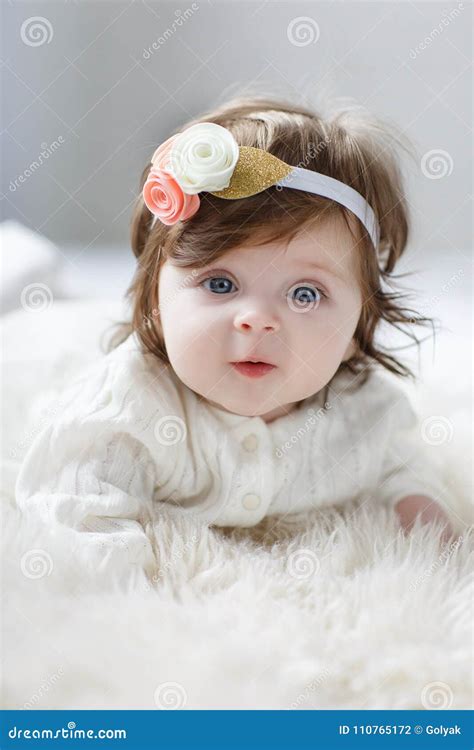 Cute Baby Girls With Brown Hair And Blue Eyes