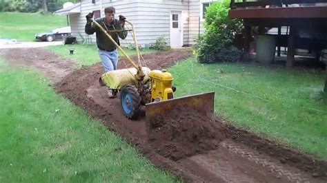 Rototiller working hard at 70 years old - YouTube