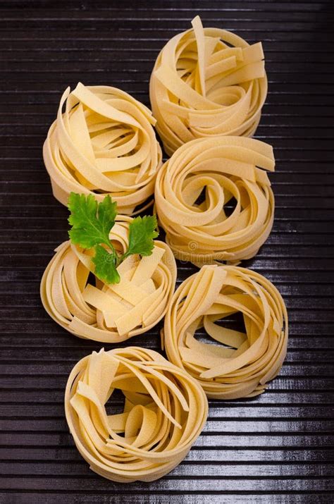 Traditional Dry Fettuccine Pasta Stock Photo - Image of homemade, eggs: 135161530