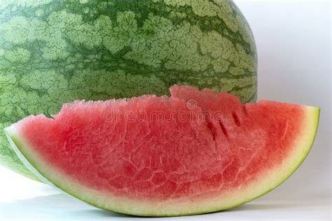 Big watermelon and slice stock image. Image of slice - 179382381