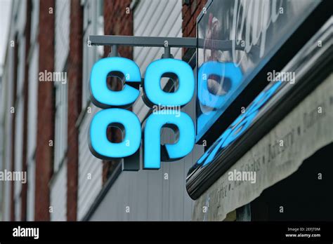 Close up of the blue logo of the CO-OP supermarket chain, England UK ...