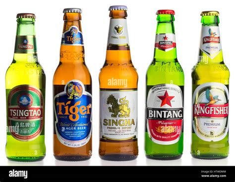 Selection of asian lager beers isolated on a white background Stock Photo - Alamy