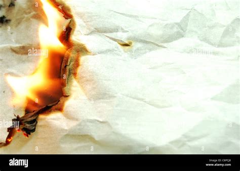 Burning paper background Stock Photo - Alamy