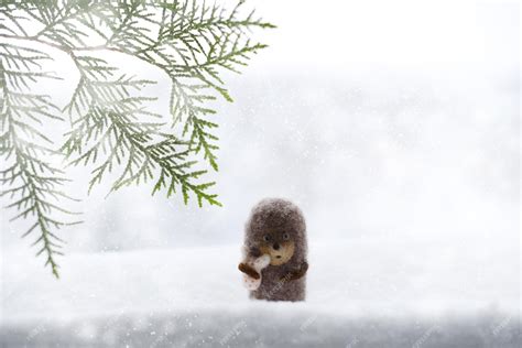 Premium Photo | Cute little hedgehog snowy winter background christmas ...