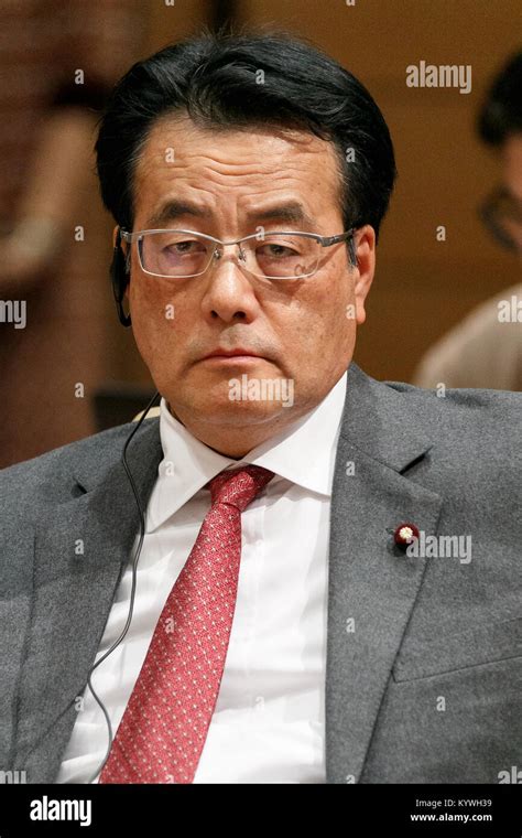 Katsuya Okada who was Deputy Prime Minister of Japan, attends a debate with representatives of ...