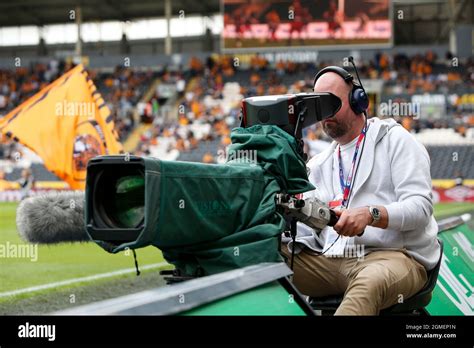 Camera crew films the match Stock Photo - Alamy