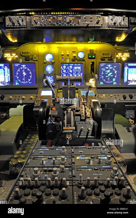 Cockpit of a Boeing 737 - 700 in a central console with hand throttles, flight simulator by the ...