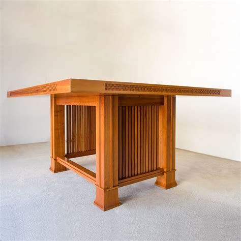 Vintage Husser table designed by Frank Lloyd Wright