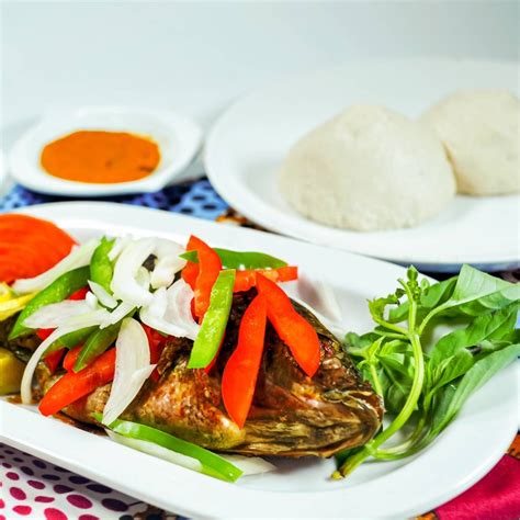 Banku With Tilapia Fish - An Authentic Traditional Recipe | Recipe in 2023 | Traditional food ...