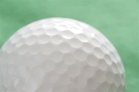 Free Stock Photo 10987 Close up of a white golf ball | freeimageslive