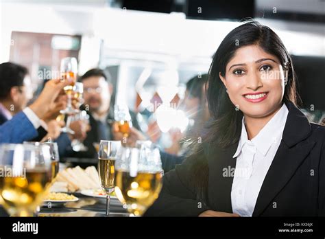 Indian Business Female sitting dining table With Partners Company- Party Restaurant Stock Photo ...