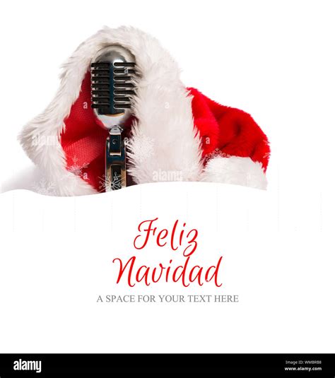 Feliz navidad against snow border Stock Photo - Alamy