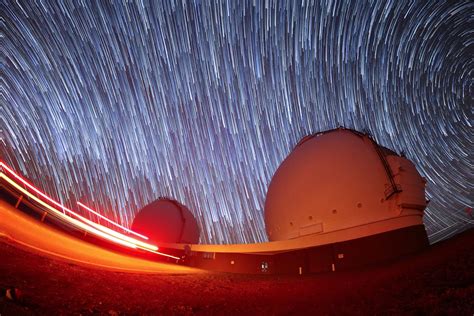 POLI'AHU, A Hypnotic Timelapse of the Starry Night Skies Over the Mauna Kea Observatories in Hawaii